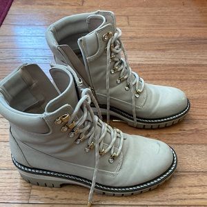 Jennifer Lopez boots, tan gently worn